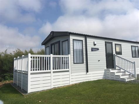 Featuring a kitchen with a microwave and a fridge, each unit also comes with a cable flat-screen TV, ironing facilities, wardrobe and a seating area with a sofa. . Static caravans to rent long term bridgwater